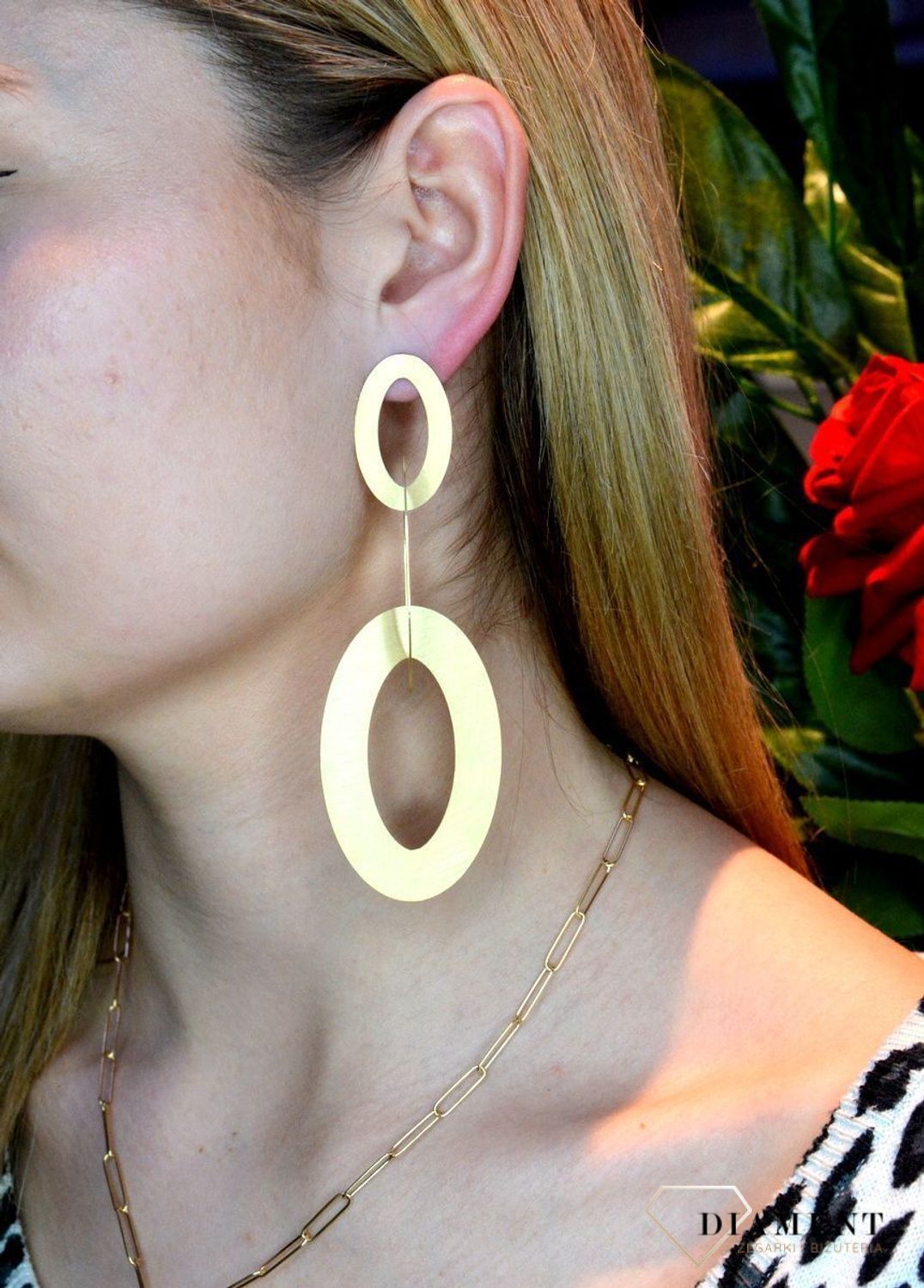 Srebrne kolczyki duże owalne w pozłoceniu OR AQ H0460304. Idealny pomysł na prezent. Kolczyki wykonane z najwyższej jakości srebra próby 925. Idealne kolczyki na uroczystość. Długość całkowita 11 cm..jpg